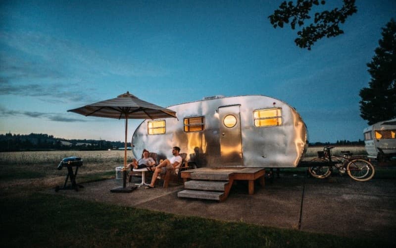 Vintage RV under star filled sky